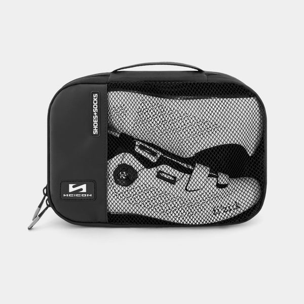 Scicon shoe storage bag in black, featuring a compact design with a zipper closure and carrying handle for organized shoe storage.