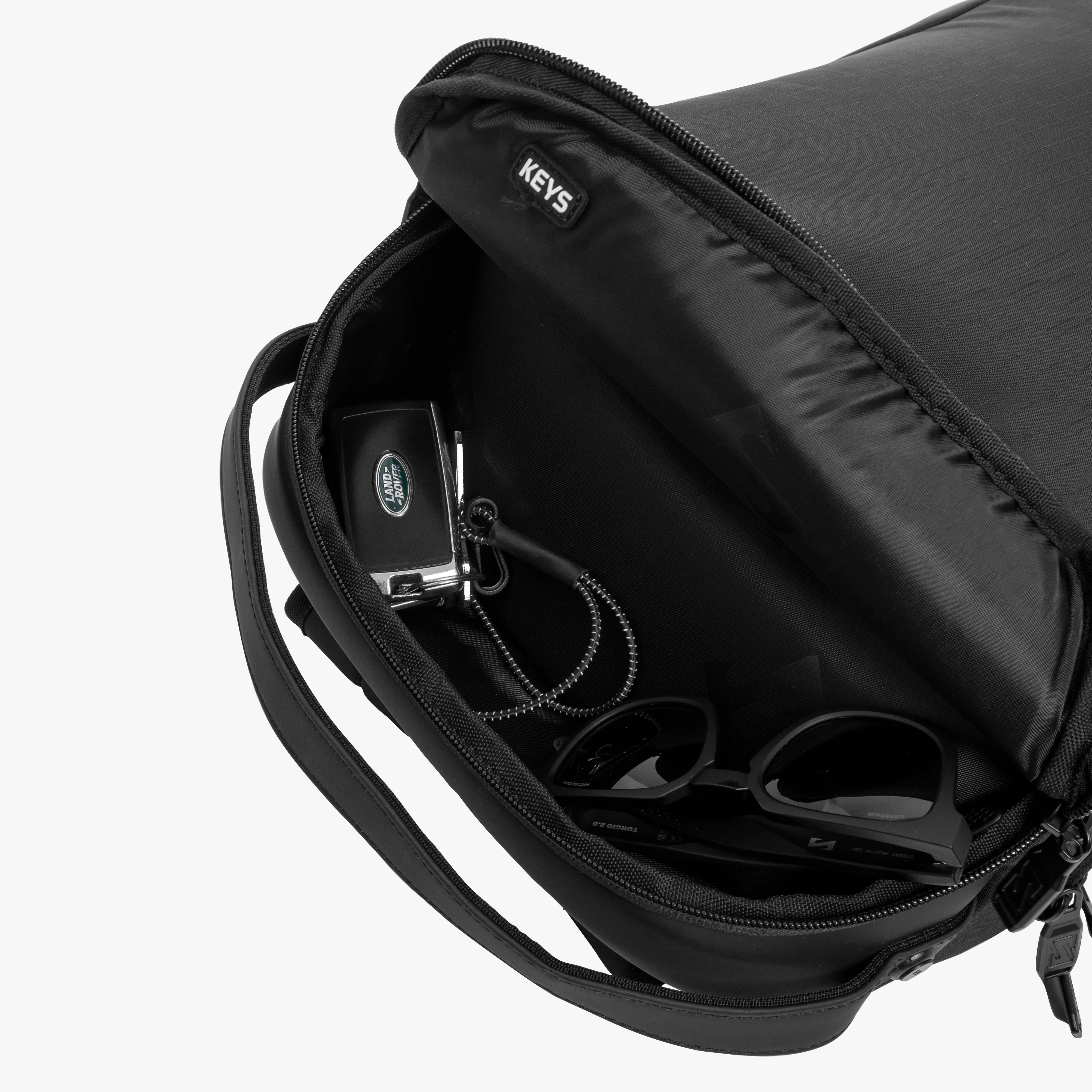 Scicon Urban Style 15L backpack with multiple compartments, black durable fabric, and padded shoulder straps for everyday use.