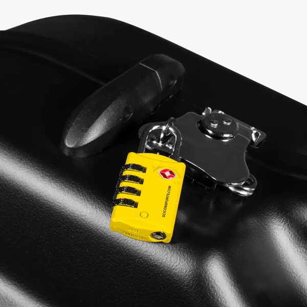 Red Scicon TSA luggage padlock with keyhole and secure locking mechanism for travel safety and luggage protection.